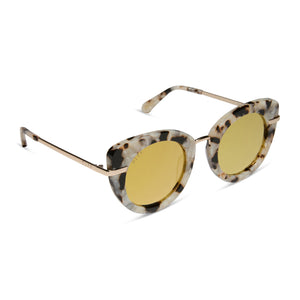 harry potter x diff eyewear featuring the hedwig cat eye sunglasses with a gold frame and gold lenses angled view