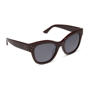 iconica featuring the eva cat eye sunglasses with a bordeaux brown frame and grey polarized lenses angled view