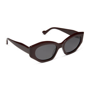 iconica featuring the margot cat eye sunglasses with a bordeaux brown frame and grey polarized lenses angled view